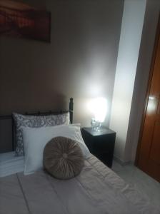 A bed or beds in a room at Eirini's Apartment