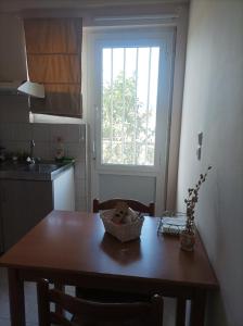 A kitchen or kitchenette at Eirini's Apartment