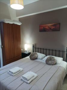 A bed or beds in a room at Eirini's Apartment
