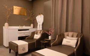 Posezení v ubytování Hôtel Barrière Le Grand Hôtel Dinard