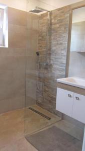 Ein Badezimmer in der Unterkunft Enjoyit-WS