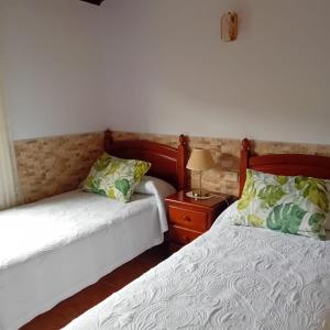 A bed or beds in a room at CASA DE LA CRUZ