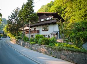 a house sitting on the side of a road at Studio Nonntal in Salzburg