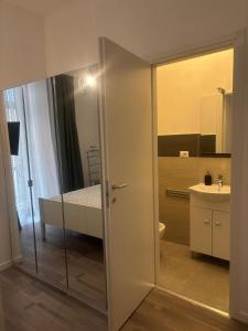 Koupelna v ubytování PORTA FURBA Suites + 38 fotografií