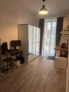 Kuchyň nebo kuchyňský kout v ubytování PORTA FURBA Suites