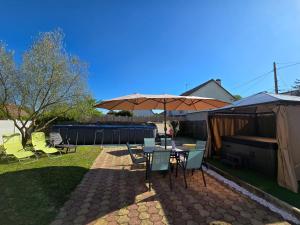 Zahrada ubytování Appartement T2 confortable - Piscine et Jacuzzi