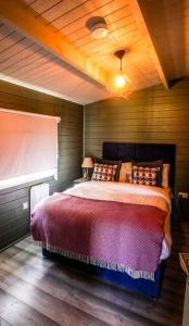 Krevet ili kreveti u jedinici u okviru objekta Springfort Hall Log Cabins