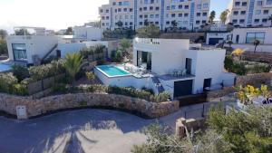 Basen w obiekcie Deluxe VILLA LAVANDA Las Colinas DEHESA DE CAMPOAMOR with HEATED POOL lub w pobliżu
