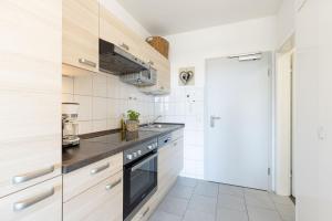 Kuchyň nebo kuchyňský kout v ubytování Haus Seebad Ostseeperle Grömitz