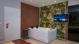TV a/nebo společenská místnost v ubytování 313 Villa + 21 fotografií