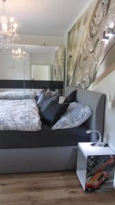 Ein Bett oder Betten in einem Zimmer der Unterkunft Enjoyit-WS