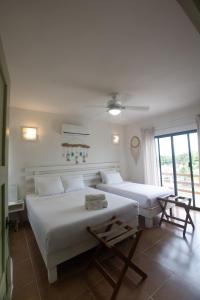 Postel nebo postele na pokoji v ubytování Hotel Boutique Pachamama