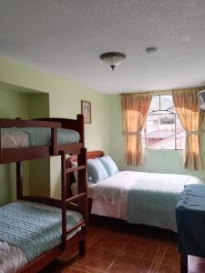 Postel nebo postele na pokoji v ubytování Hotel Amazonia y sol