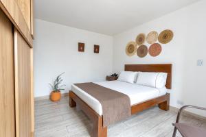 Postel nebo postele na pokoji v ubytování Hotel Prada