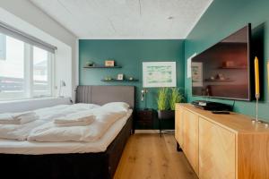 Postel nebo postele na pokoji v ubytování 3BR Apartment in Tórshavn - Central - Parking
