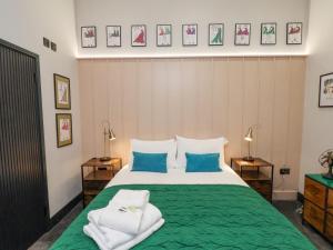 Postel nebo postele na pokoji v ubytování The Old Jet Workshop