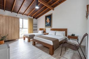 Postel nebo postele na pokoji v ubytování Hotel Prada