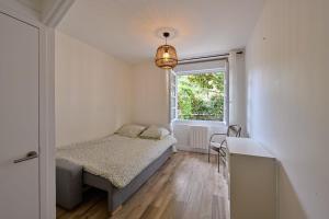 En eller flere senge i et værelse på Centre Pornichet - 7 min à pied plage