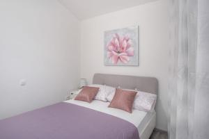 Postel nebo postele na pokoji v ubytování Seaside apartments Polić, Rogoznica