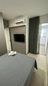 TV a/nebo společenská místnost v ubytování Apartamento Premium - Próximo do Minas Centro e Mercado Central BH