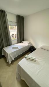 Postel nebo postele na pokoji v ubytování Apartamento Premium - Próximo do Minas Centro e Mercado Central BH + 20 fotografií