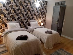 Postel nebo postele na pokoji v ubytování Maison isivier