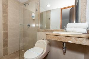 Koupelna v ubytování Hotel Prada