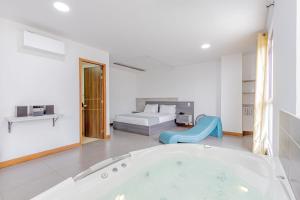 Postel nebo postele na pokoji v ubytování Hotel Prada