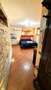 A bed or beds in a room at Alloggio Gladiolo