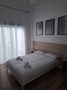 Postel nebo postele na pokoji v ubytování Moderno y práctico Estrena en Algeciras