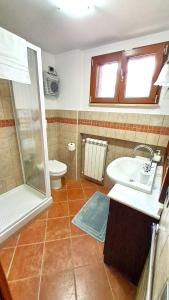 A bathroom at Alloggio Gladiolo