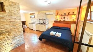 A kitchen or kitchenette at Alloggio Gladiolo