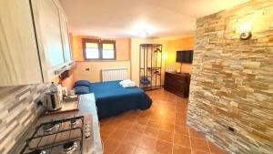 A kitchen or kitchenette at Alloggio Gladiolo