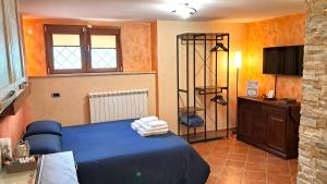 A bed or beds in a room at Alloggio Gladiolo