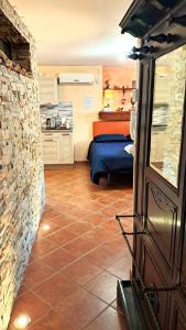 A kitchen or kitchenette at Alloggio Gladiolo