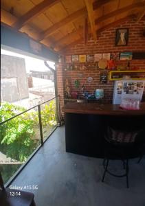 a kitchen with a counter and a sink in a room at Espaço do Mar in Olinda +37 photos