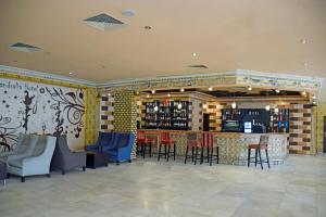 Khu vực lounge/bar tại Sandralia Hotel Limited, Abuja
