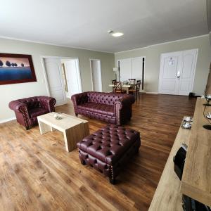 Uma área de estar em Xelena Hotel & Suites