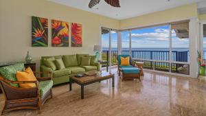 a living room with a view of the ocean at Kapalua Bay Villa 30B1 in Kapalua