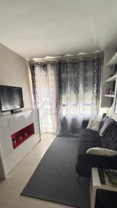 TV/trung tâm giải trí tại Apartamento acogedor +8 ảnh