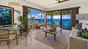 a living room with a view of the ocean at Kapalua Bay Villa 30B2 in Kapalua