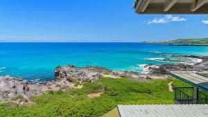 a view of the ocean from a house at Kapalua Bay Villa 30B2 in Kapalua