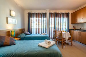 Φωτογραφία από το άλμπουμ του Apartamentos Turisticos Monte da Vinha II σε Αλμπουφέιρα