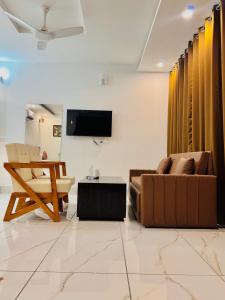 Televiisor ja/või meelelahutuskeskus majutusasutuses Natures Nook Shivpuri