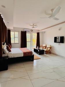 Voodi või voodid majutusasutuse Natures Nook Shivpuri toas