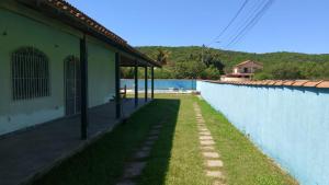 Πισίνα στο ή κοντά στο Casa temporada em Iguaba Grande