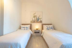 Posteľ alebo postele v izbe v ubytovaní Sophia Areopoli Guesthouse