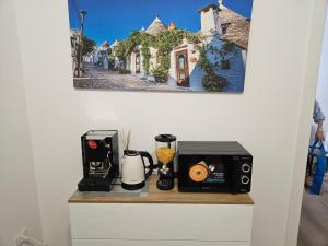 Příslušenství pro přípravu čaje a kávy v ubytování Vincotto's home garden