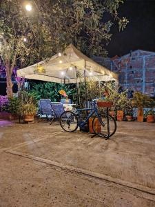 a bike parked in front of a tent at Sea Natural in San Gil