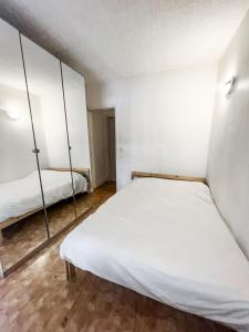 Postel nebo postele na pokoji v ubytování Nice stay near to Paris